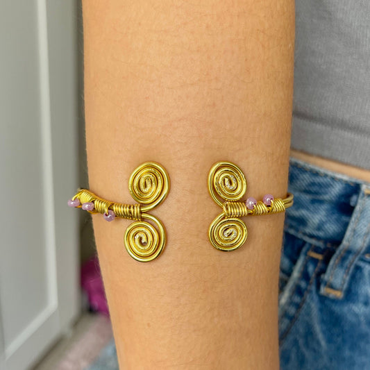 Double spiral gold bangle